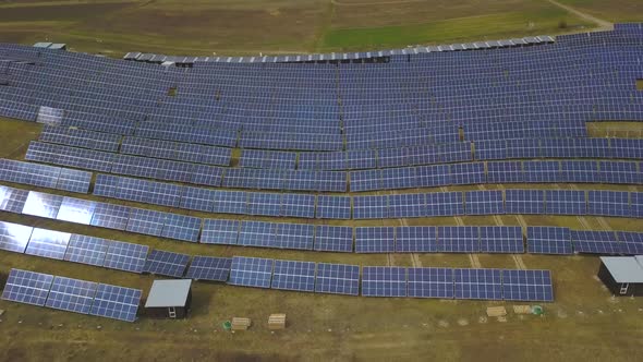 Solar Panels Farm (solar cell). Renewable green alternative energy concept - Aerial view