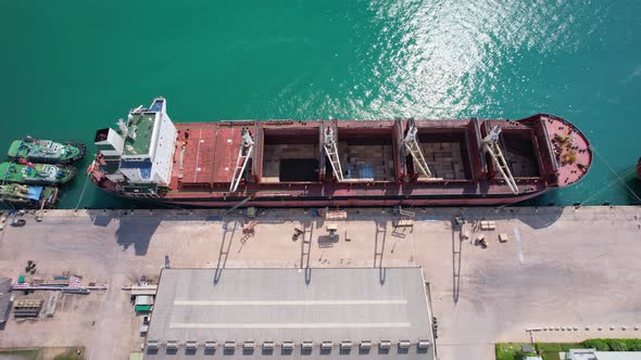 Aerial view of cargo ship carrying container.Container ship loading and unloading in deep sea port