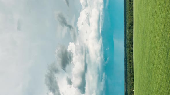 Vertical Vertical Shot Time Lapse Dronelapse Hyperlapse Of Countryside Rural Field Or Meadow