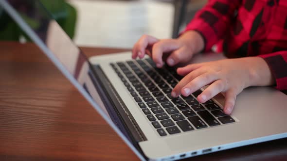 Hands of Student Young Manager Pressing Keys Laptop Keypad