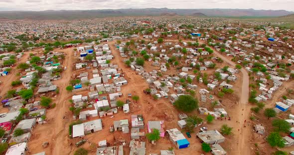 A Bird's-eye View Taken Over a City with Ruined Houses in Namibia, Africa. The Poor People Live in alt