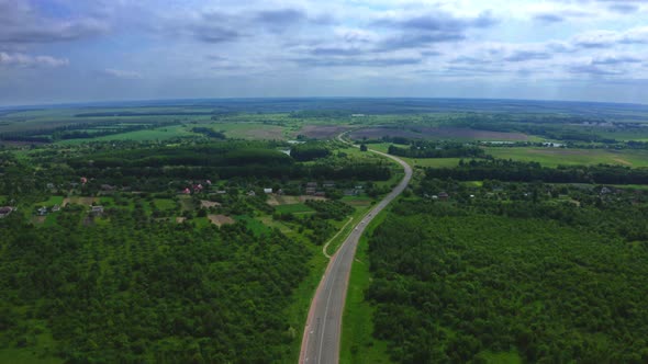 Aerial View Of Cars On Highway At Nature