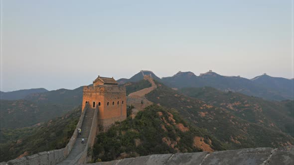 sunset panning shot of the great wall of china