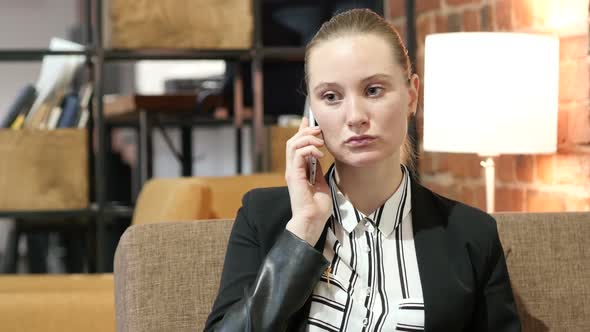 Business Woman Talking On Smartphone