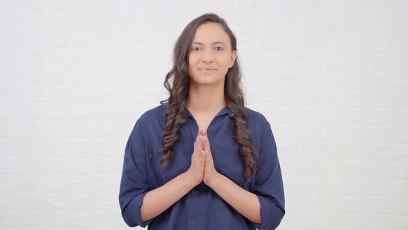 Indian girl doing Namaste