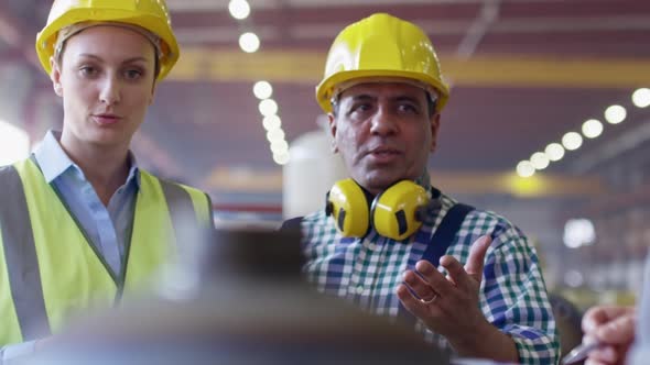 Factory Inspectors Working at Industrial Sites