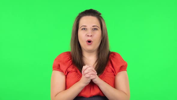 Portrait of Cute Girl Listening Information Then Surprised and Very Rejoice. Green Screen