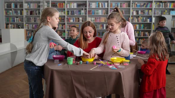 Teacher Communicating with Kids During Masterclass