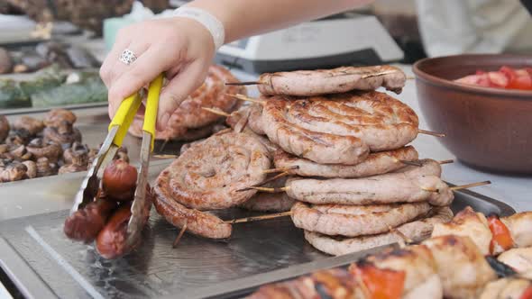 Ready-to-Eat Grilled Meat in a Street Food Shop Window. Ready-made Food on Party