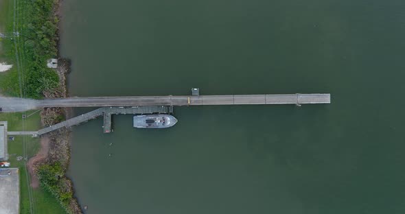 Birdseye view of small boat docked at port