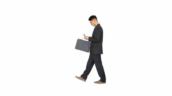 Young business man walking counting euro bills on white background.