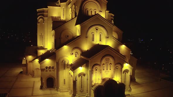 Aerial view. Tsminda Sameba Cathedral at night. Tbilisi. Georgia