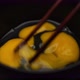 Mixing raw eggs with chopsticks - VideoHive Item for Sale