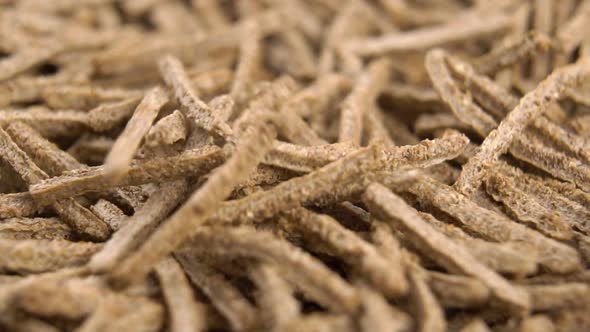 Cereal bran fiber sticks. Macro. Falling in slow motion