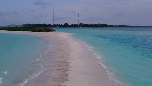 Drone aerial scenery of tourist beach break by blue sea and sand background