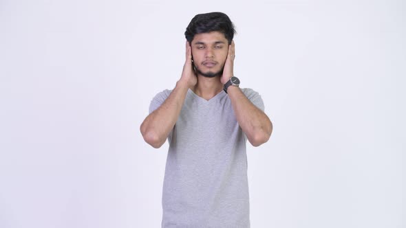 Young Handsome Bearded Indian Man Doing Three Wise Monkeys Concept