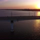 Aerial Shot of Big Bridge Covering the Dnipro at Shimmering Sunset in Summer - VideoHive Item for Sale