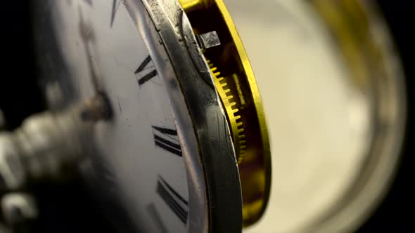 Working Mechanism of the Clock Gear Closeup Rotate . Black Background. Close Up . Sound