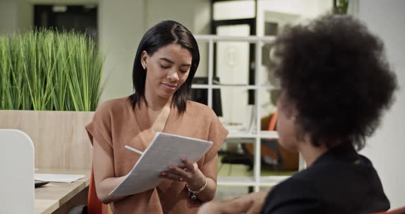 Black Businesswomen Doing Paperwork Together