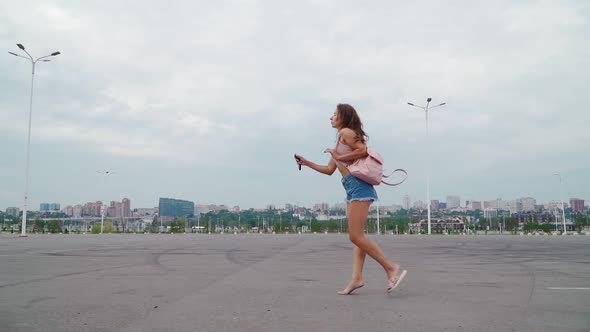 Woman Perfect Figure Walks Beautiful Gait Waves Her Foot Up While Taking Off Her Shoes