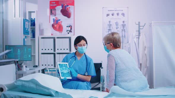 Nurse Talking with Senior Woman