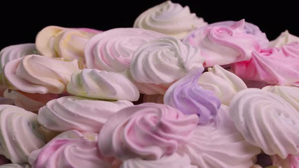 Twirl of Sweet Meringue Rotating on Black Background