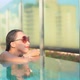 Young asian woman enjoy around outdoor swimming pool for leisure - VideoHive Item for Sale