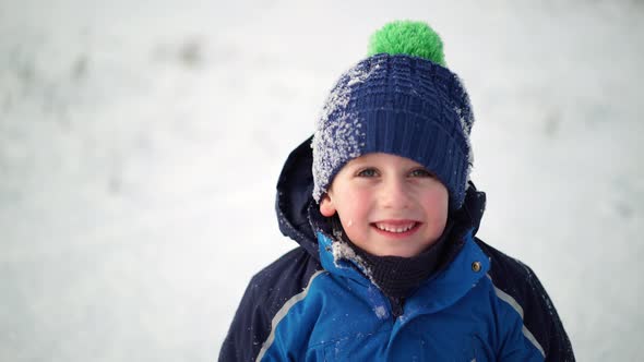 Boy in Winter Clothes Smiling