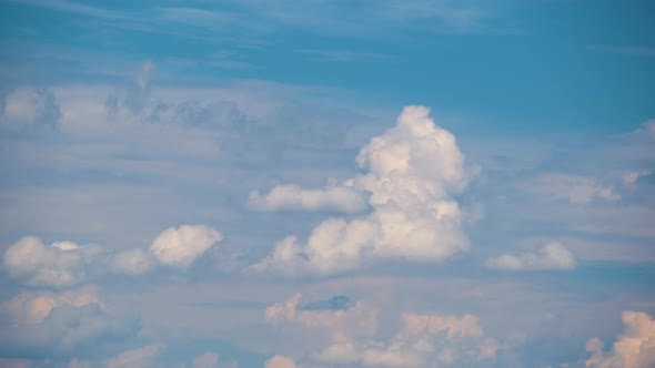 Time Lapse Footage of Fast Moving White Puffy Cumulus Clouds on Blue Clear Sky