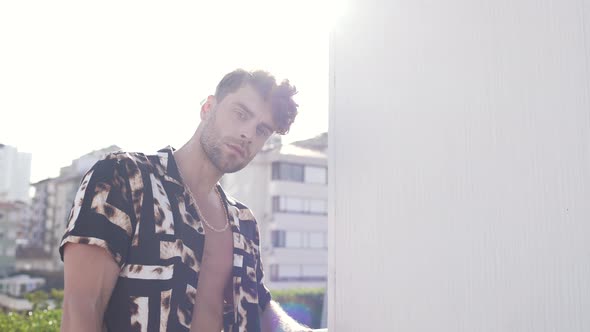 Guy Model in Casual Clothes Posing on the Street