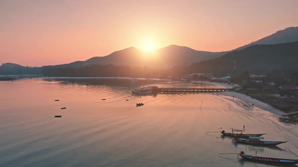 Aerial Pink Tropical Island Sunset Sunrise Over Ocean