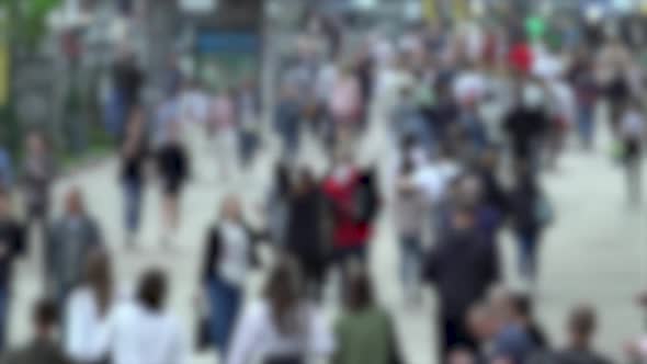 Silhouettes of People Walking in a Crowd Slow Motion