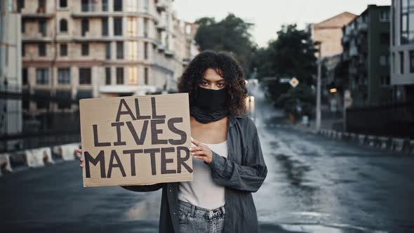 Africanamerican Woman in Black Bandana on Face