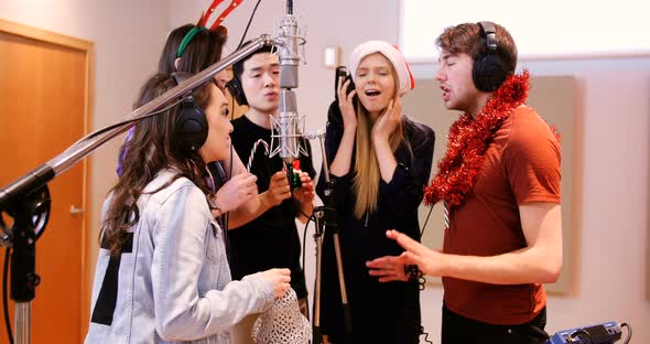 Singers performing in studio