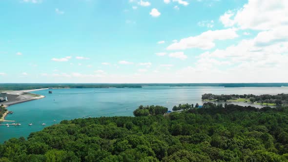 Aerial drone footage of the dam and the lake in Lake Murray, South Carolina.