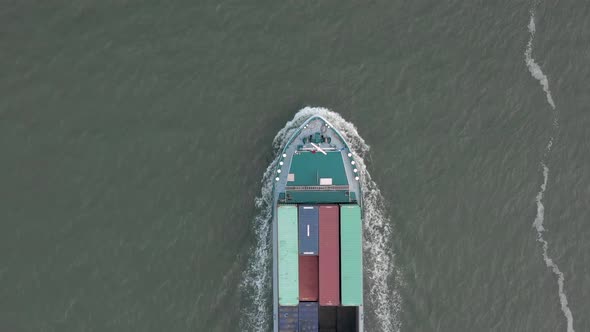 Bird's Eye View of a Cargo Shipping Container Ship at Sea