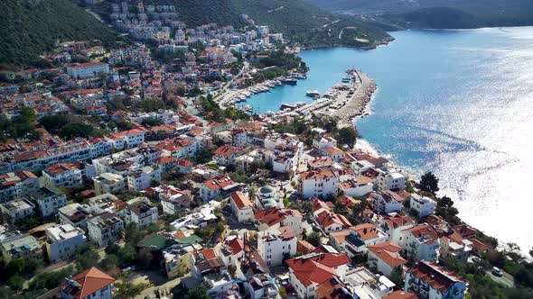 The top view from the drone of Kas resorts, bay, yahts, city in Mugla in Turkey