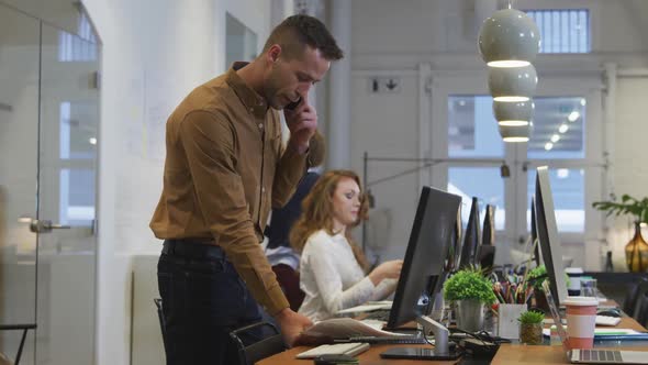 Business people working on computer in office