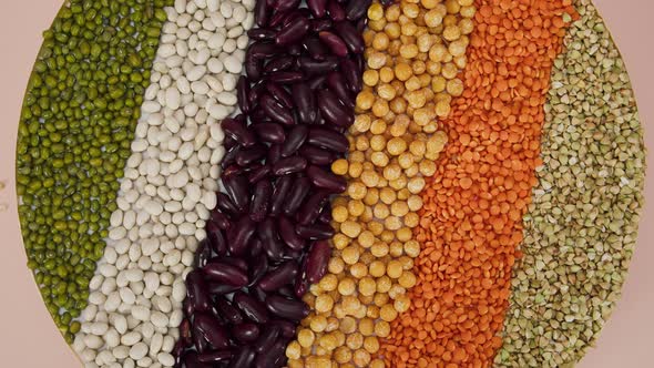 Closeup of Rotating Stripes of White and Red Beans with Chickpeas Mung and Lentils