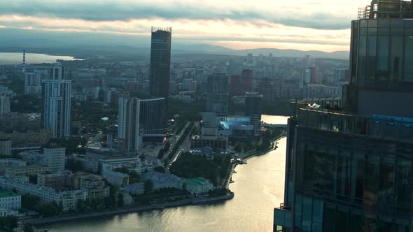 Aerial View of a Modern City at Sunset