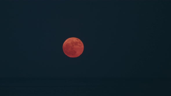 Full Moon Moonrise Over the Ocean