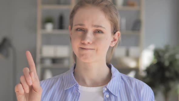 Creative Woman Rejecting Offer By Waving Finger