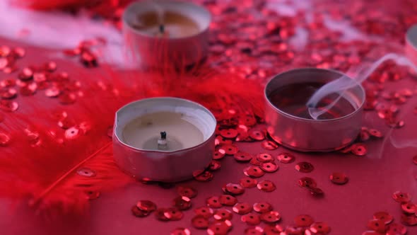 A Close Up Shot of Tea Light Candle Being Blown Out