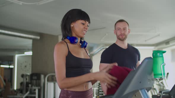 Lovely Woman Finishing Cardio Workout on Treadmill