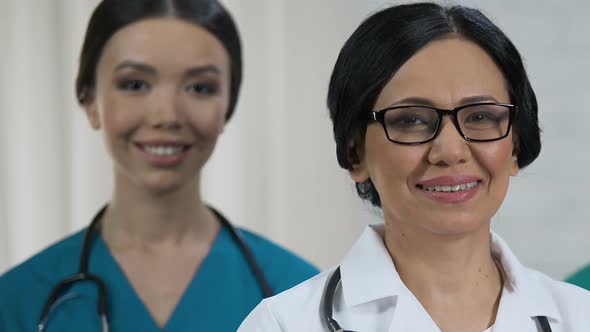 Friendly Female Medical Staff Smiling at Camera, Health Care System, Profession