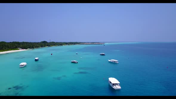 Aerial drone view travel of paradise coast beach holiday by blue green sea with white sandy backgrou