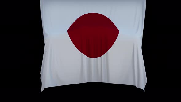 The piece of cloth falls with the flag of the State of Japan to cover the product