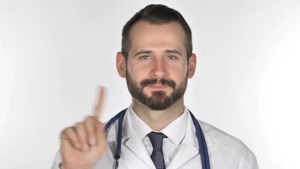 Portrait of Doctor Waving Finger to Refuse