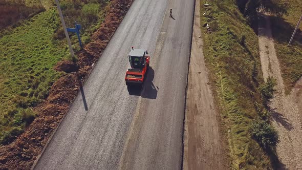 Road Roller Working on the New Road Construction Site