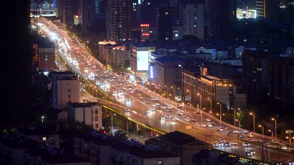 busy interchange traffic at night in city